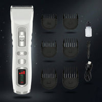 Hair trimmer set with attachments on a dark background