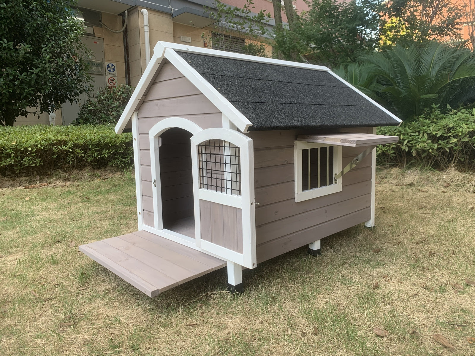 Weather-Resistant Wooden Dog Kennel - Raised Base and Asphalt Roof